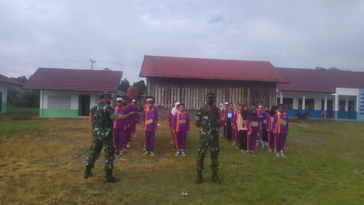 Komandan Koramil 1013-05 Gunung Purei Berikan Materi Wasbang MPLS di SMK Negeri 1 Lampoeng