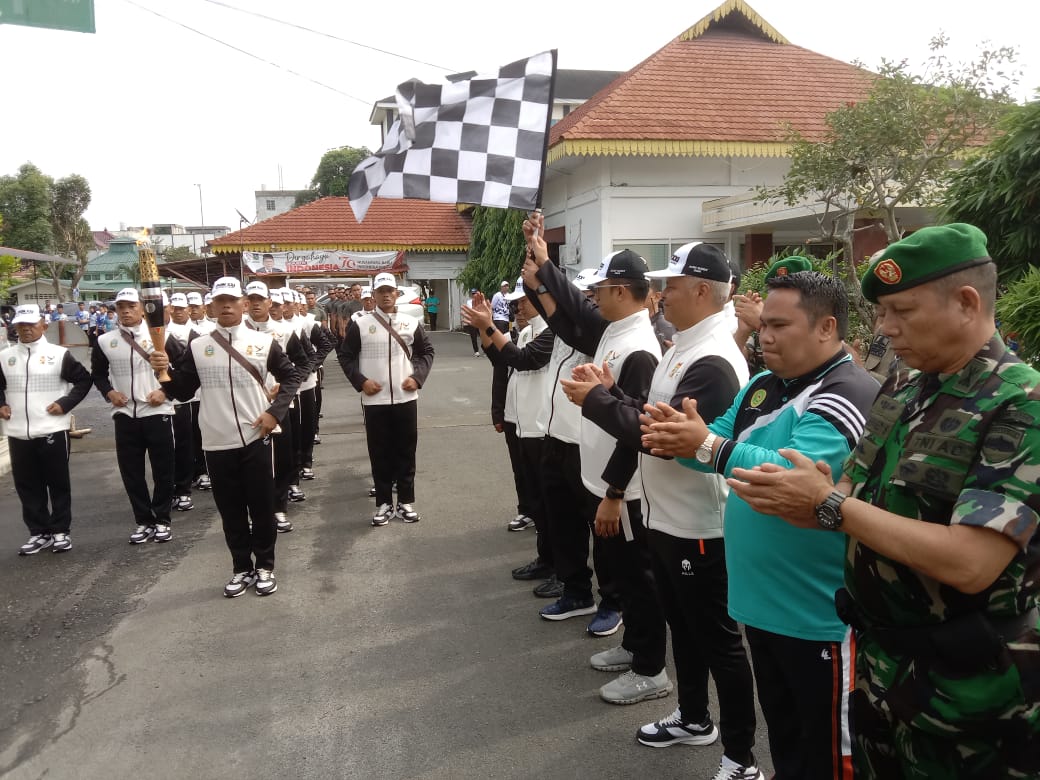 Polres Tebing Tinggi Amankan Upacara Penerimaan dan Pelepasan Kirab Api PON XXI