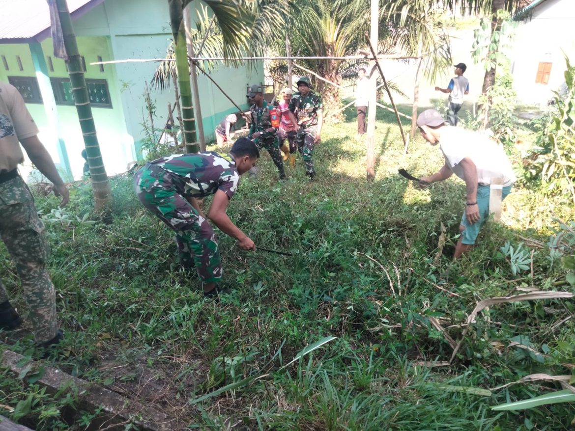 Satgas Pamtas Yonkav 12/BC Bersama Masyarakat Dukung Kebersihan Fasilitas Pendidikan di Perbatasan