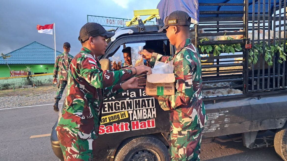 Bhakti TNI Pembagian Minuman Sehat Berupa Susu Gratis dan Makanan Ringan Pos Oelbinose