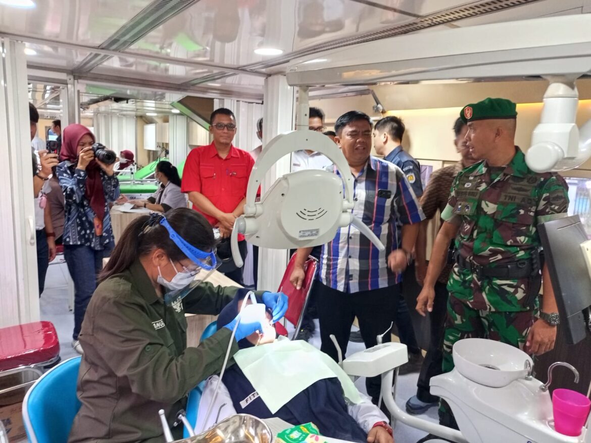 Polsek Dolok Merawan Hadiri Bakti Sosial Rail Clinic di Stasiun Bajalingge