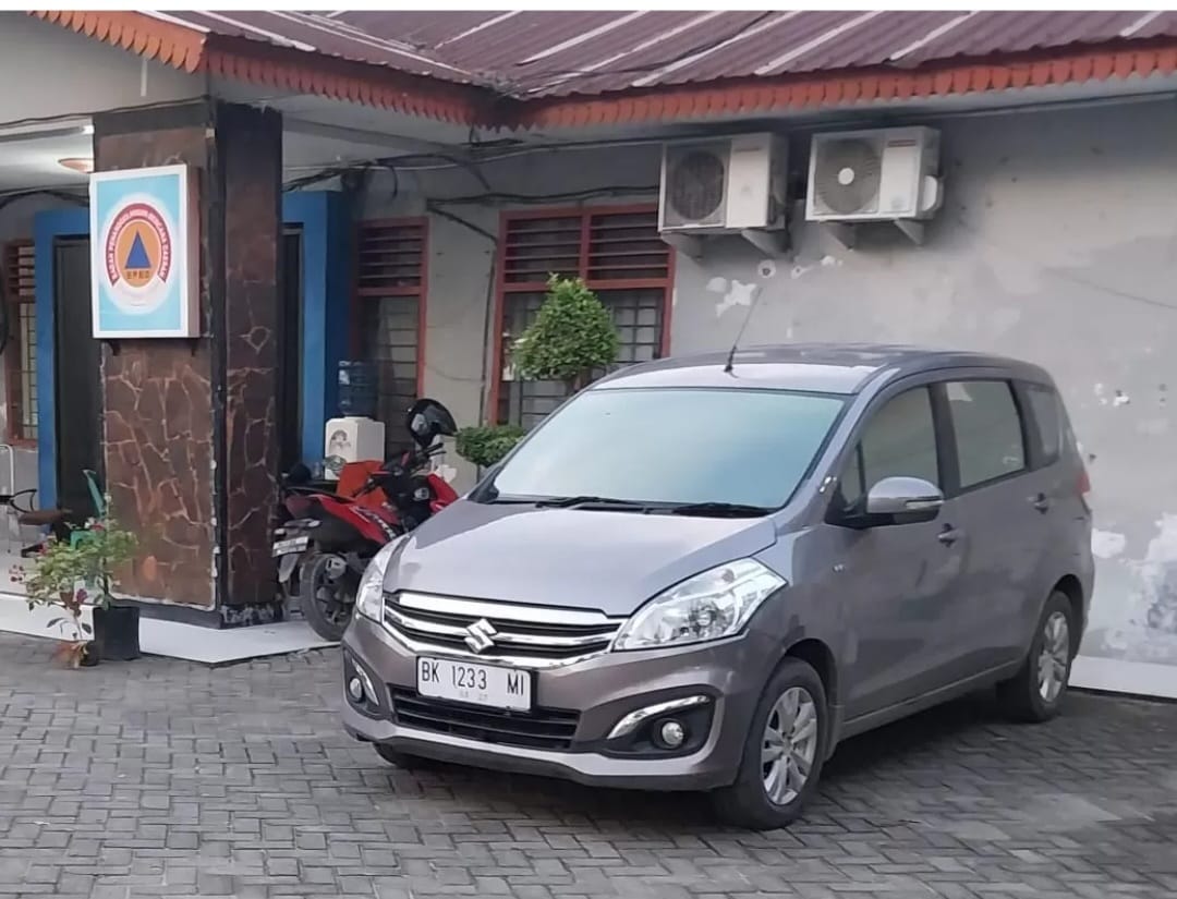 SEKDIS BPBD DELI SERDANG GUNAKAN PLAT MOBIL DINAS PALSU SEOLAH KEBAL HUKUM